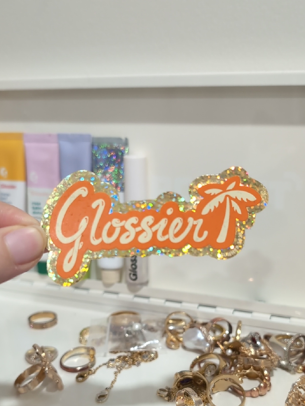 Glossier Orange Logo Sticker with Holographic Gold Trim
